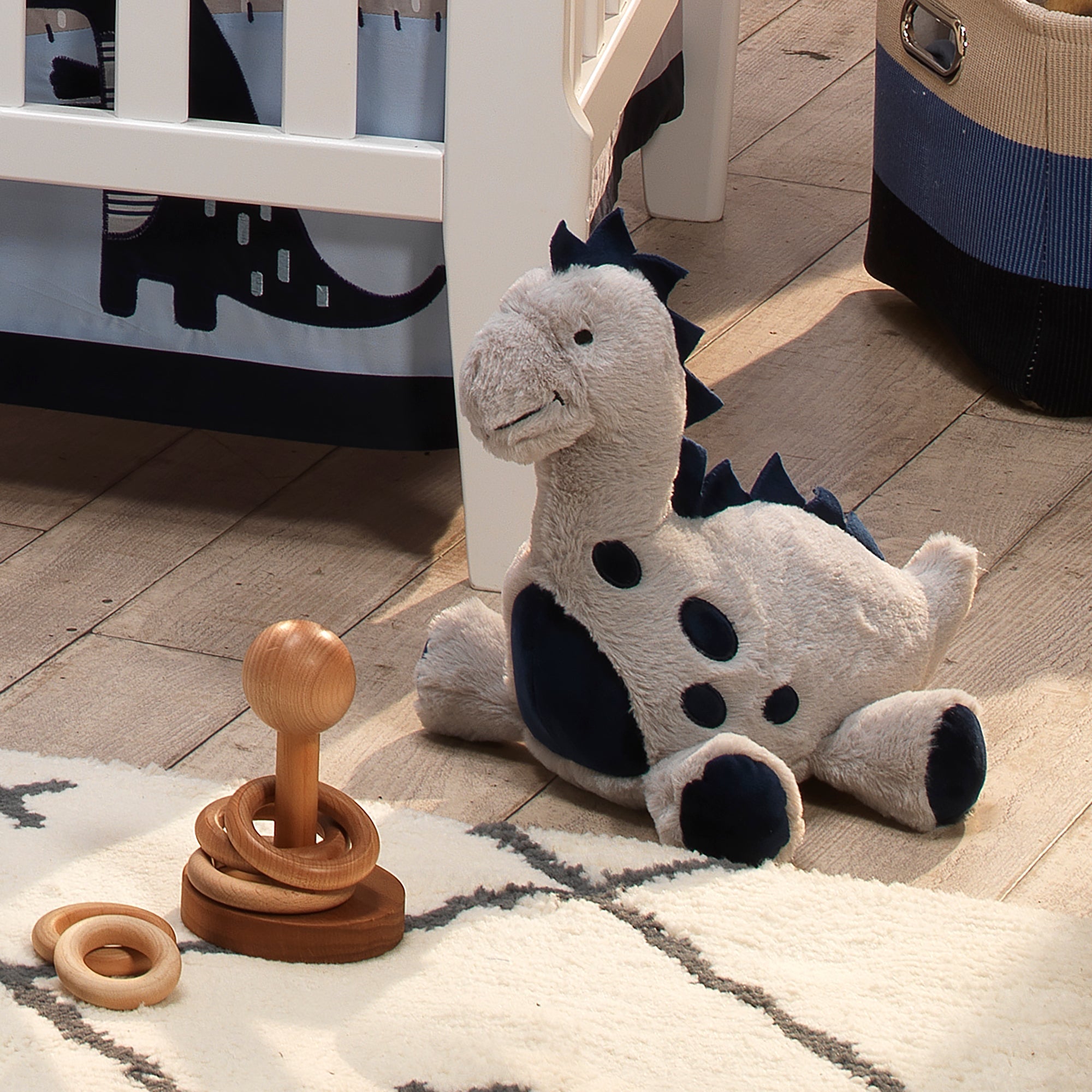 Peluche dinosaure bleu marine