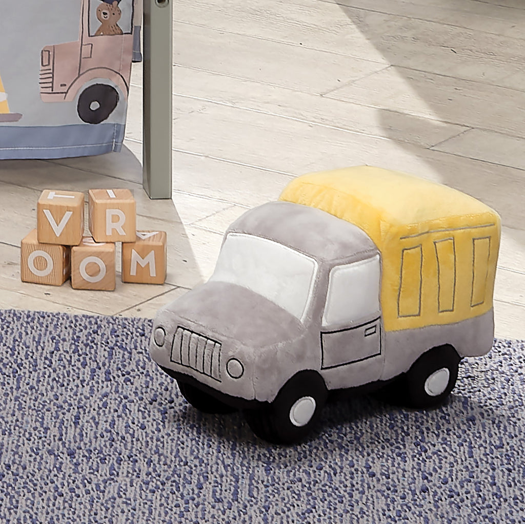 Camion benne en peluche coloré