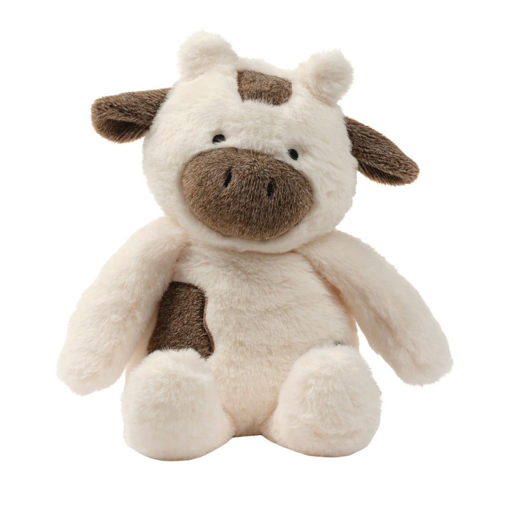 Peluche de vache en fausse fourrure blanche
