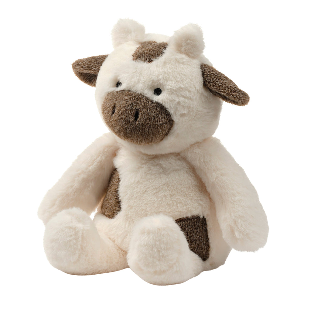 Peluche de vache en fausse fourrure blanche