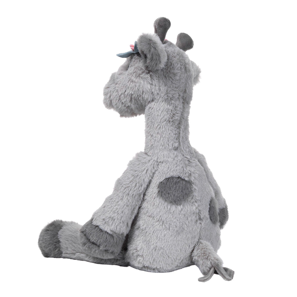 Girafe en peluche grise avec des fleurs