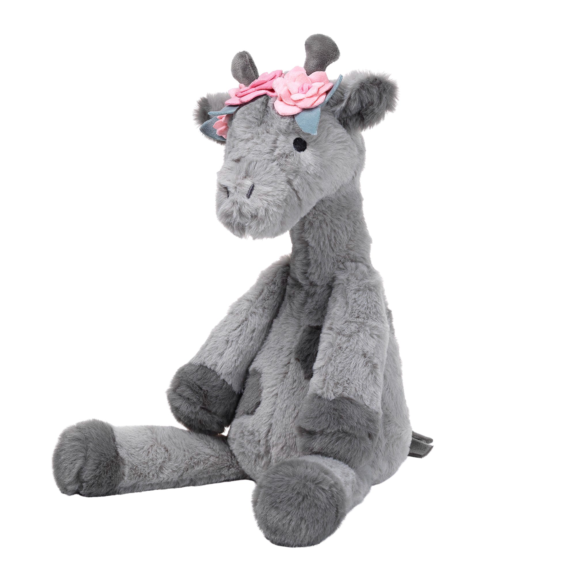 Girafe en peluche grise avec des fleurs