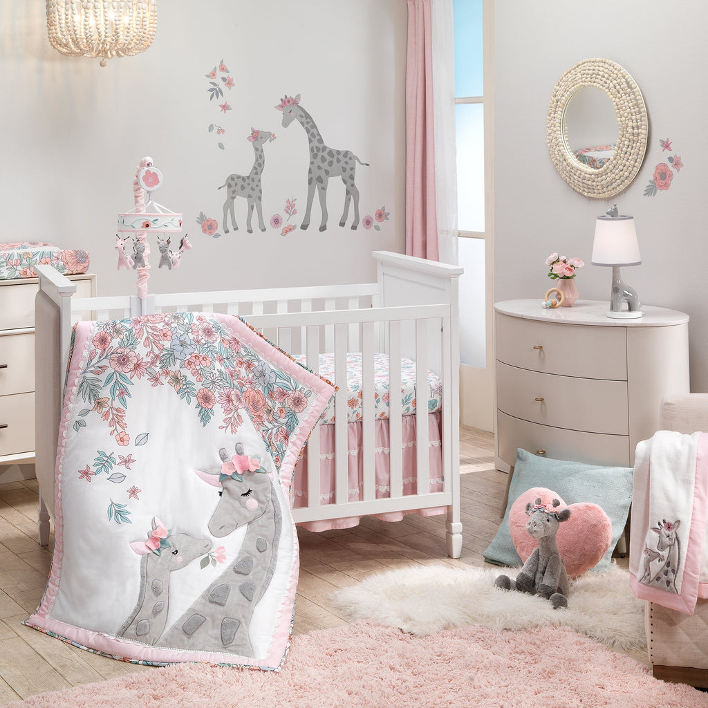 Girafe en peluche grise avec des fleurs