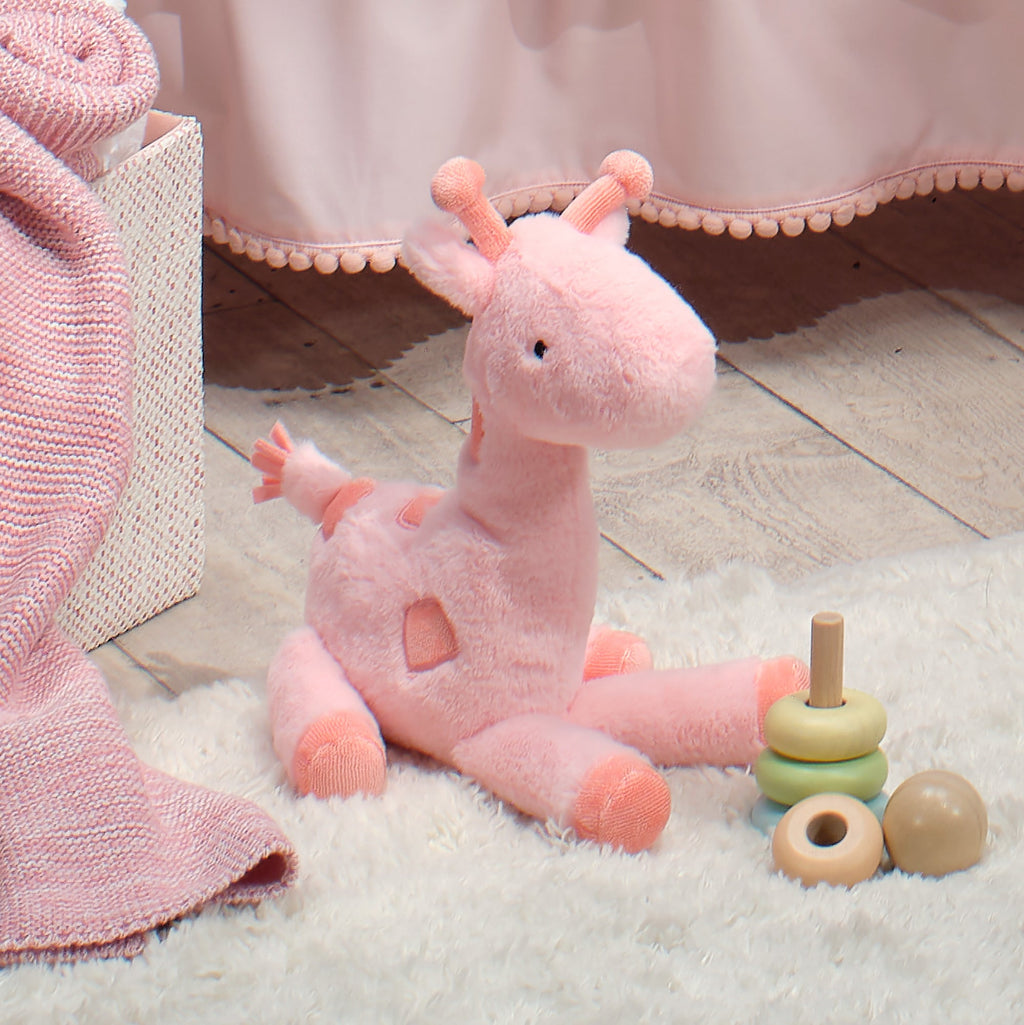 Peluche girafe rose